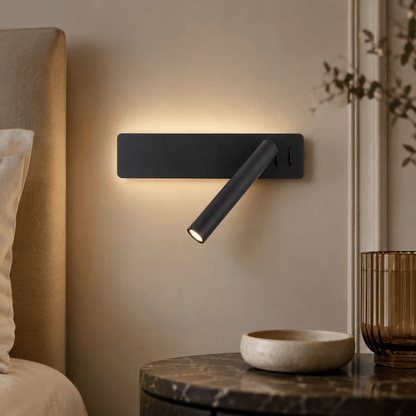LED wall light with a swiveling lamp