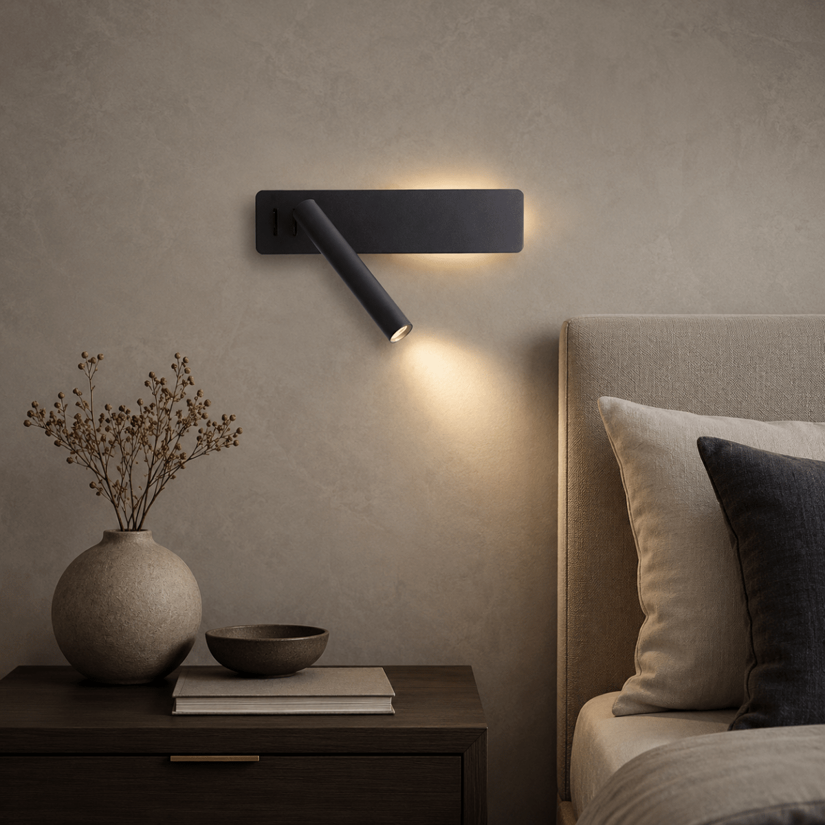 LED wall light with a swiveling lamp
