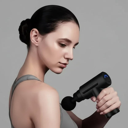 Massage gun with interchangeable attachments