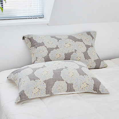 Serviette de protection pour oreiller