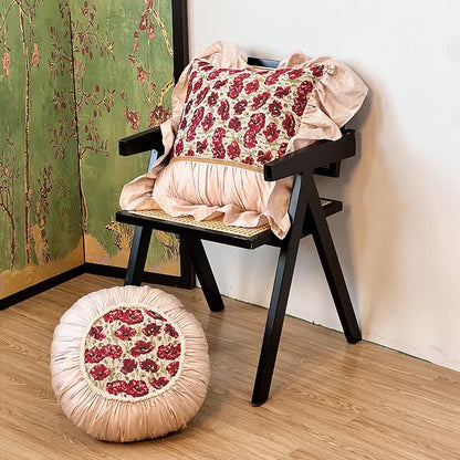 Coussin floral à volants