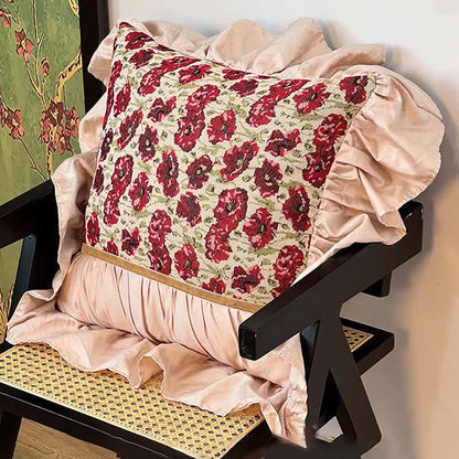 Coussin floral à volants
