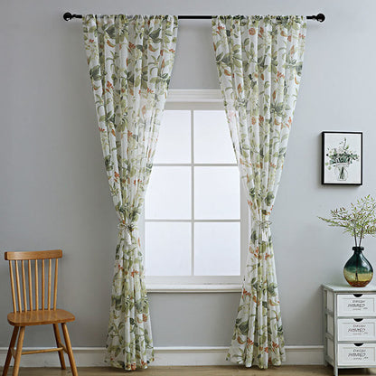 Sheer curtain with a floral pattern