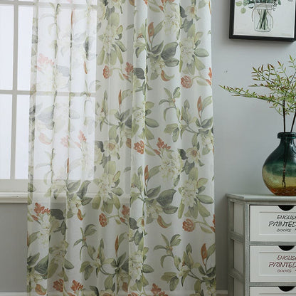 Sheer curtain with a floral pattern