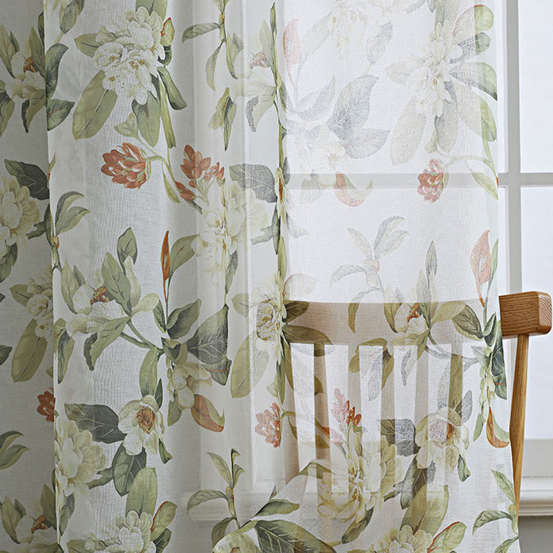 Sheer curtain with a floral pattern
