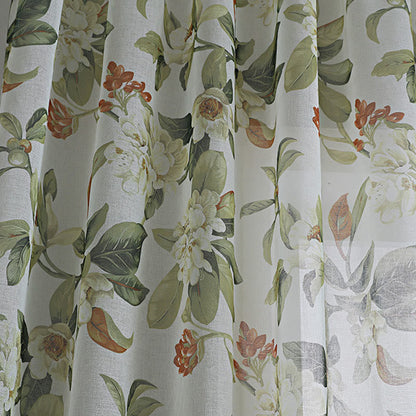 Sheer curtain with a floral pattern
