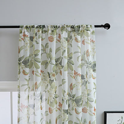 Sheer curtain with a floral pattern