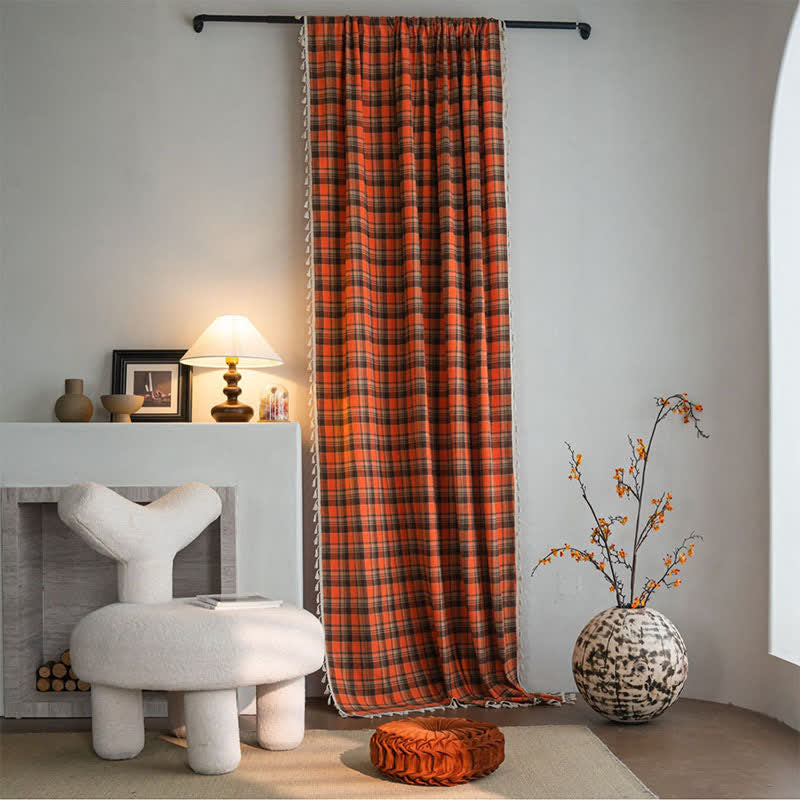 Orange checked curtain with tassels