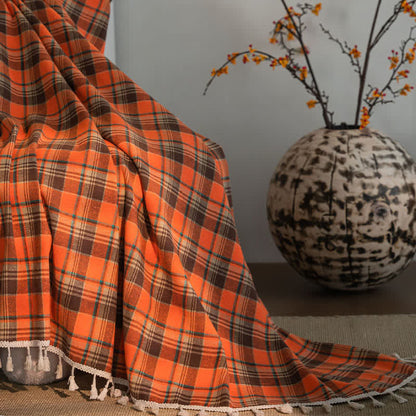 Orange checked curtain with tassels