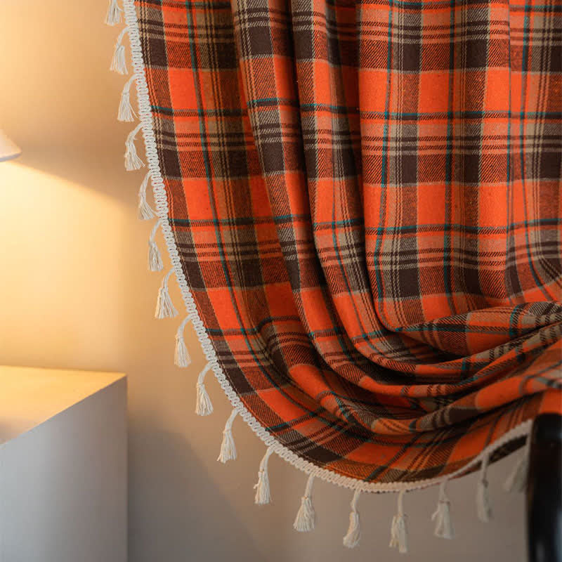 Orange checked curtain with tassels