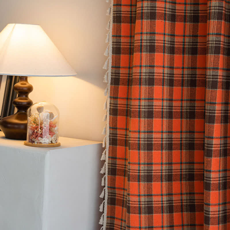 Orange checked curtain with tassels