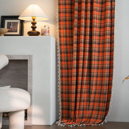 Orange checked curtain with tassels