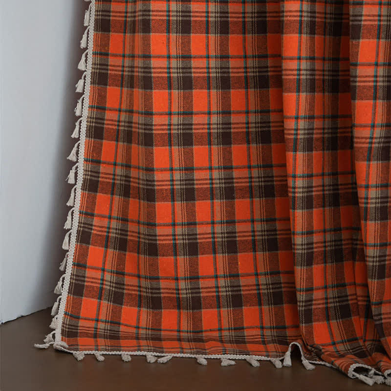 Orange checked curtain with tassels