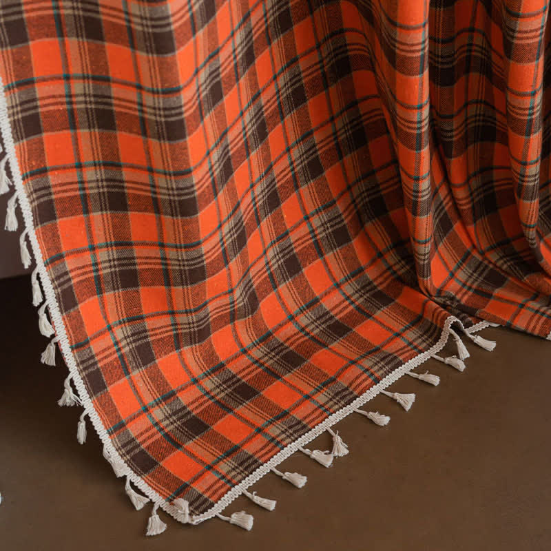 Orange checked curtain with tassels