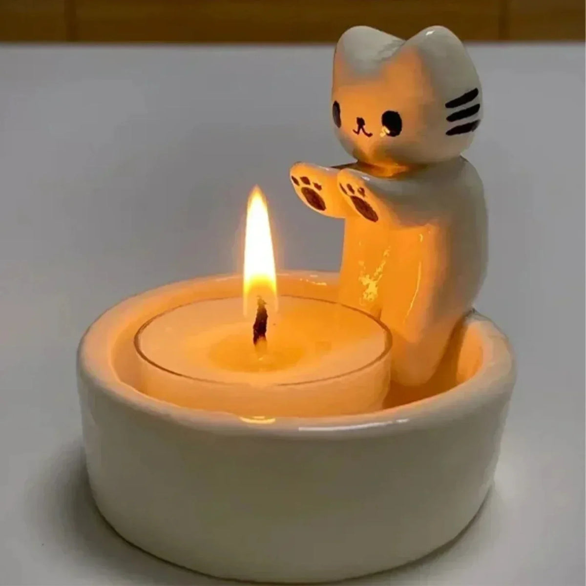 Cat-shaped candle holder