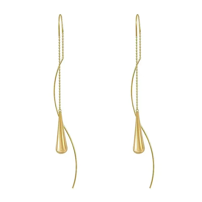 Boucles d’oreilles dorées en forme de goutte