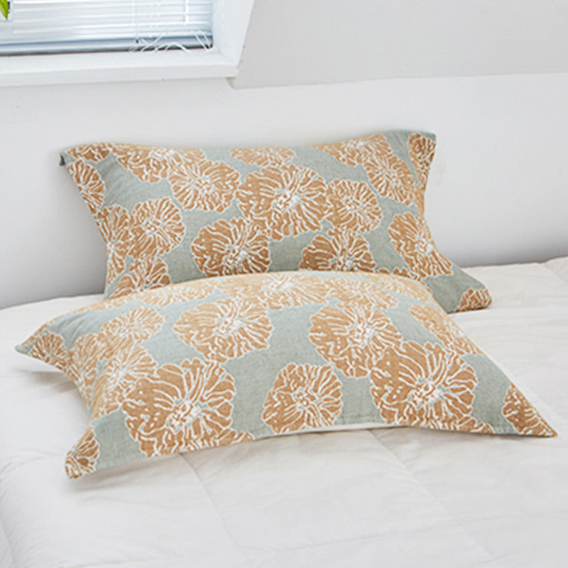 Serviette de protection pour oreiller