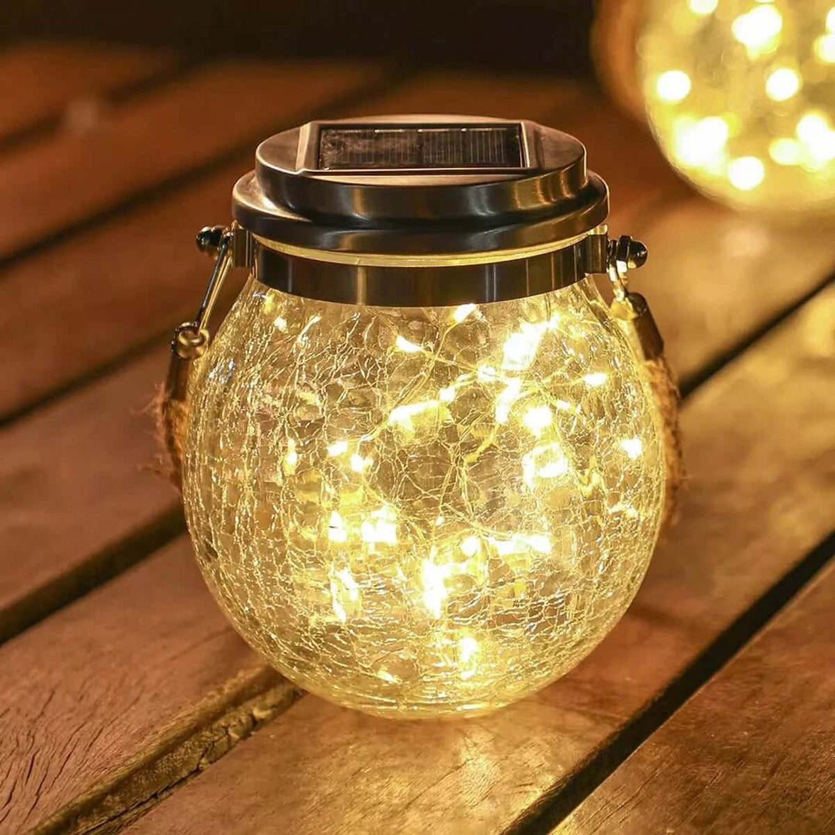 Solar garden lamp with a glass shade