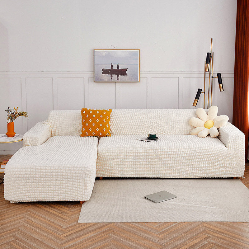 Housse extensible pour canapé