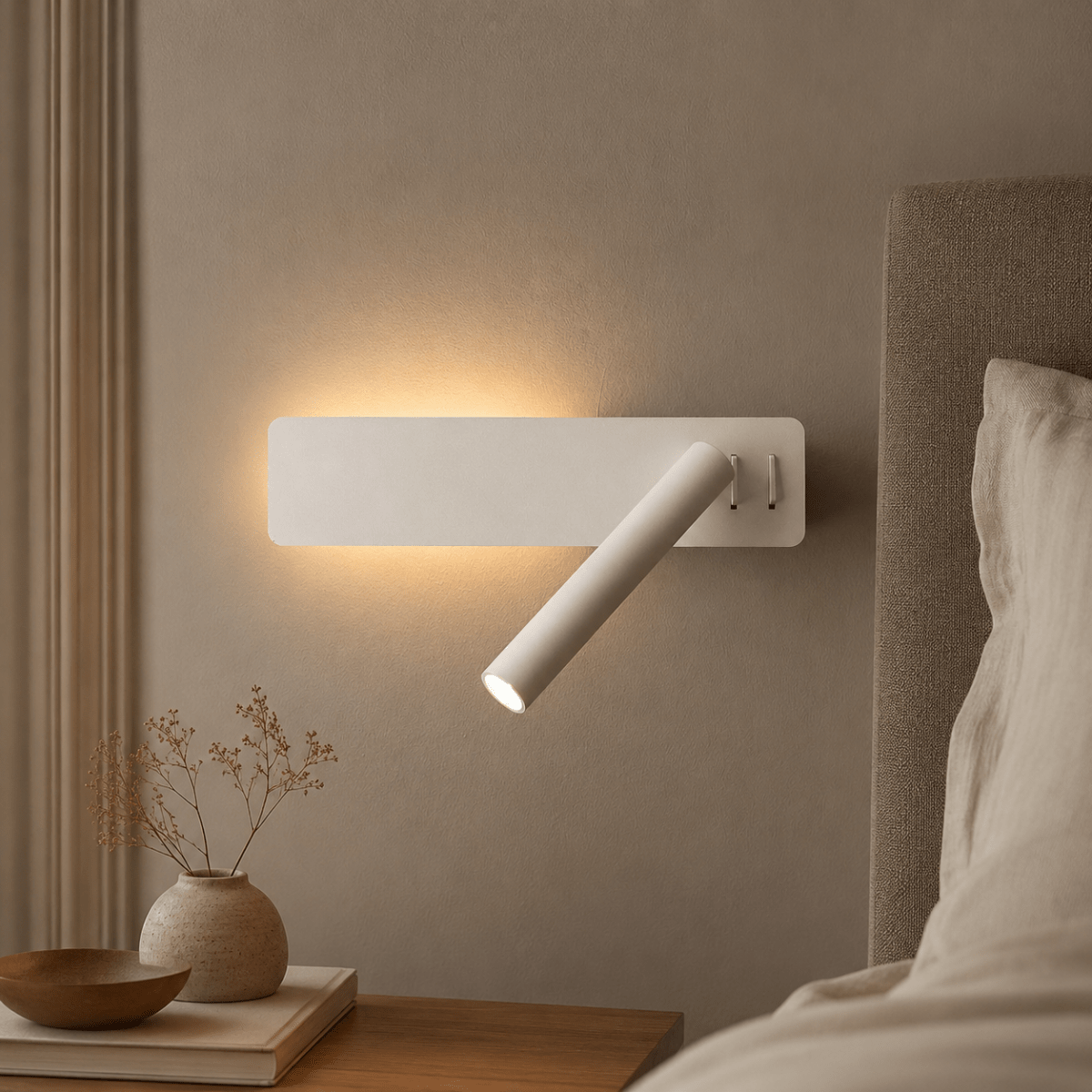 LED wall light with a swiveling lamp