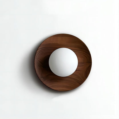 Wall lamp with a shade and wood