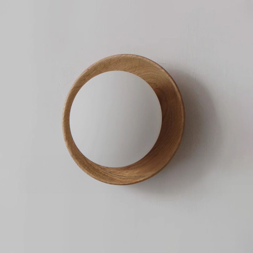 Wall lamp with a shade and wood