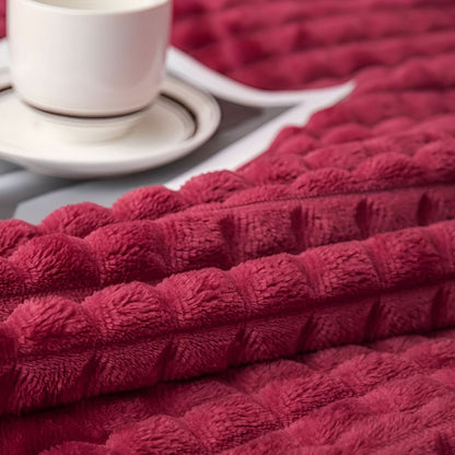 Blanket with a textured surface