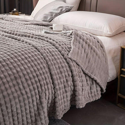 Blanket with a textured surface