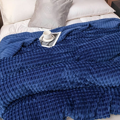 Blanket with a textured surface
