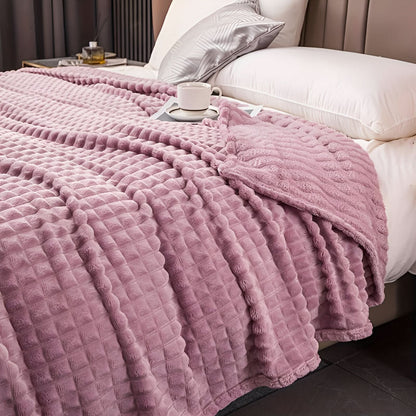 Blanket with a textured surface