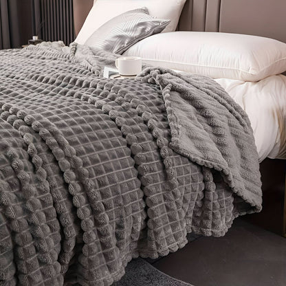 Blanket with a textured surface