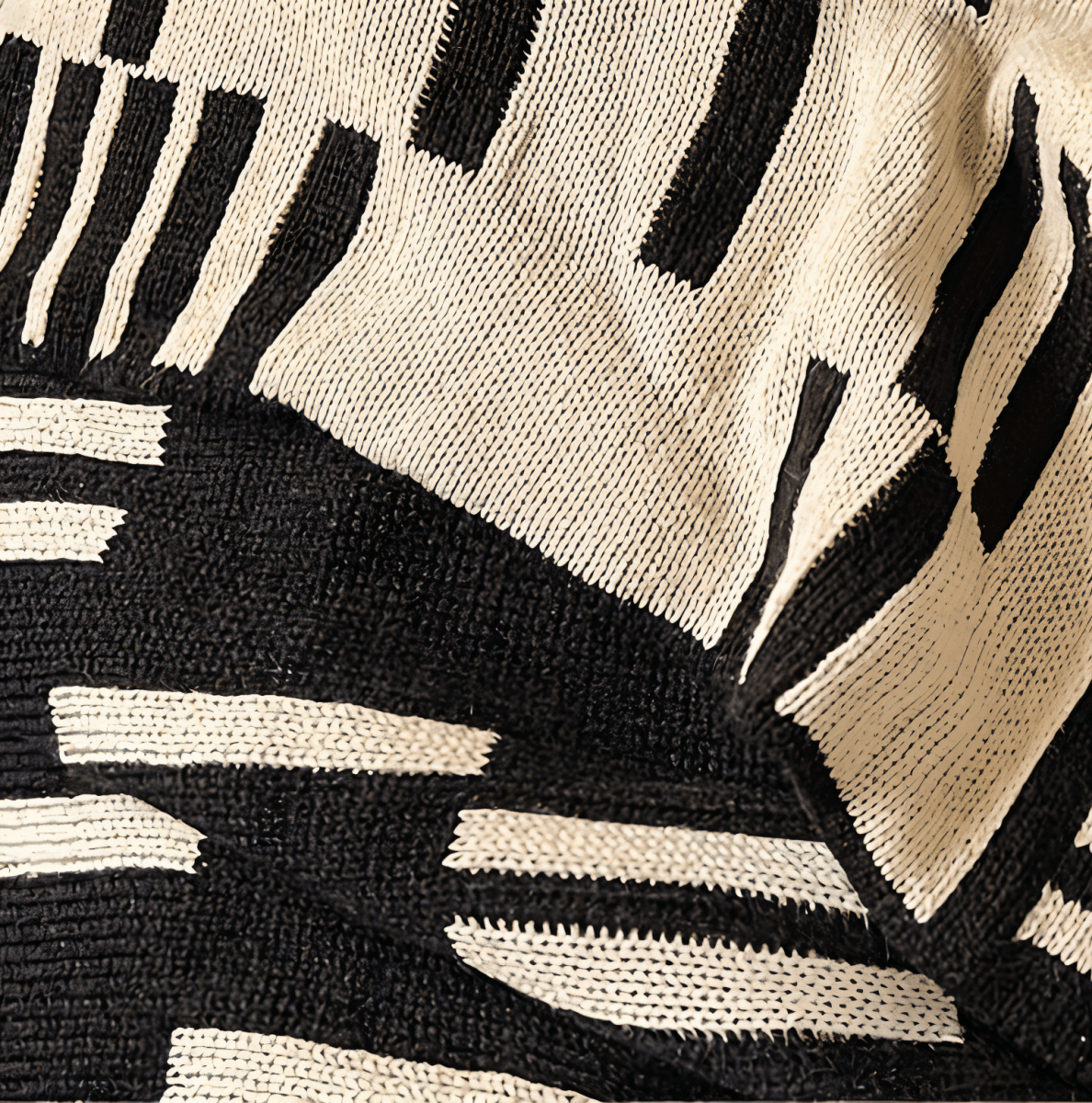 Couverture à motif noir et beige