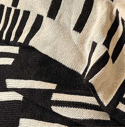 Couverture à motif noir et beige