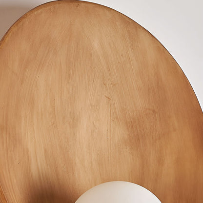 Wall lamp with a rounded design