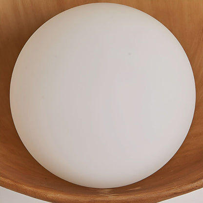 Wall lamp with a rounded design