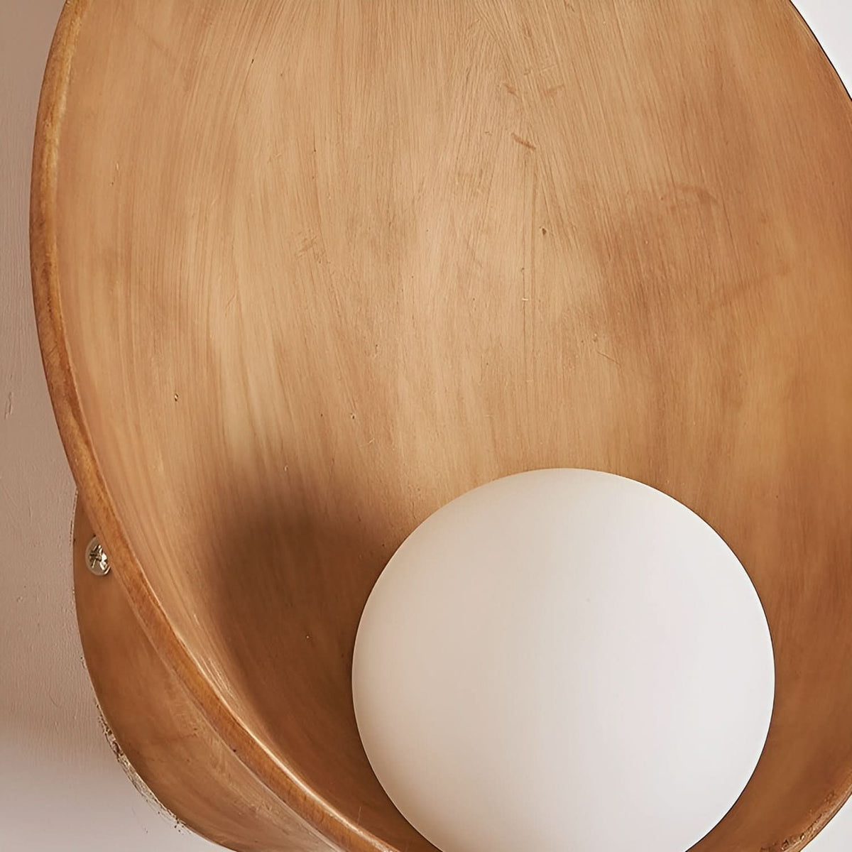 Wall lamp with a rounded design
