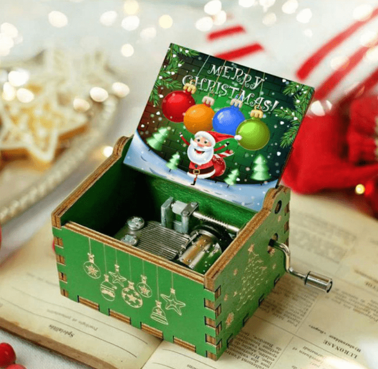 Christmas music box with a hand-wound mechanism