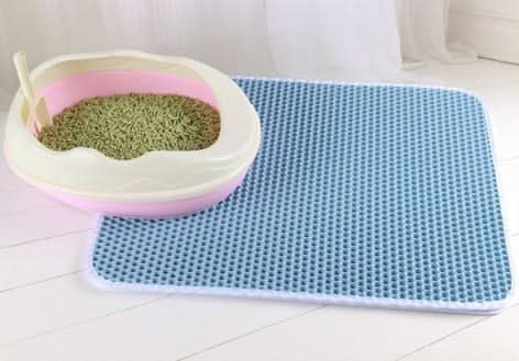 Tapis à litière double couche