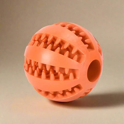 Dog ball with treat dispenser function
