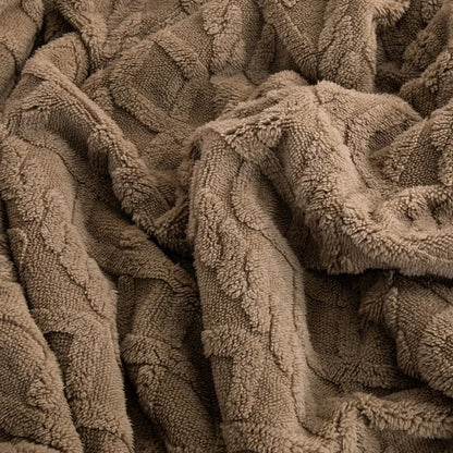 Couverture en sherpa à motif géométrique
