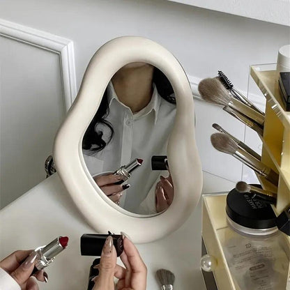 Miroir cosmétique irrégulier