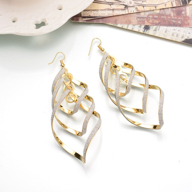 Spiral leaf motif earrings