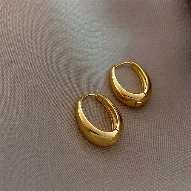Boucles d’oreilles créoles rondes dorées