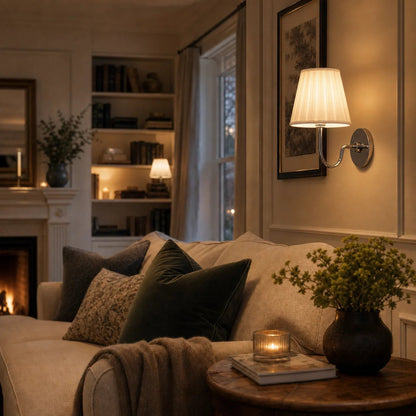 Wall lamp with a pleated shade