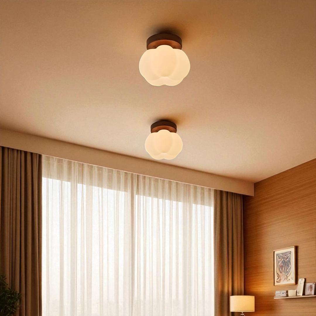Ceiling lamp with a floral shade