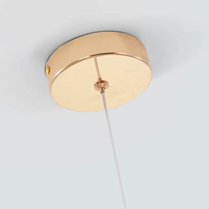 Lampa wisząca kropla ze złotym wykończeniem