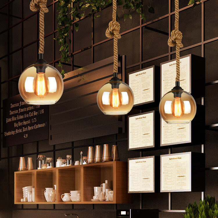 Lampe suspendue en forme de boule en verre