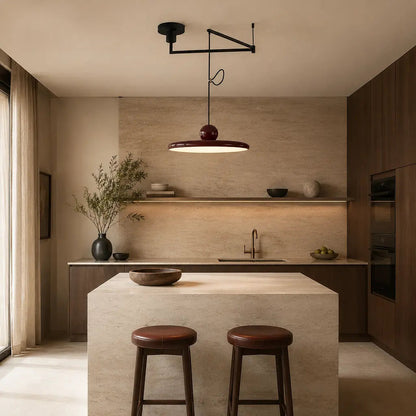 Pendant light with a shade and counterweight