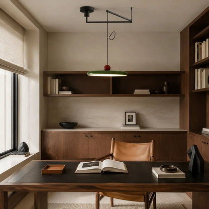 Pendant light with a shade and counterweight