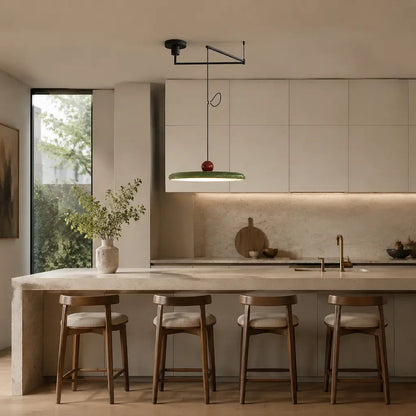 Pendant light with a shade and counterweight